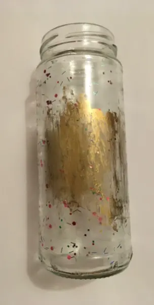 Glasvase farbglitzer und goldfarbe